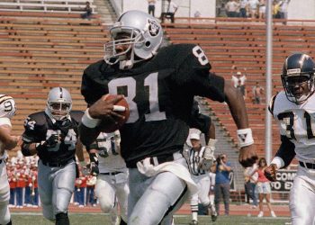 Tim Brown takes it to the house on his FIRST NFL play!