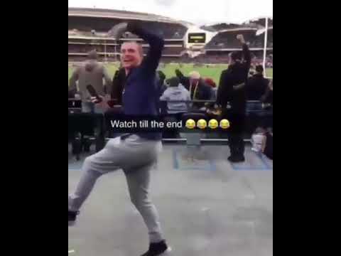 Jubilant Aussie Rules Fan Bounces Back From Hard Shoulder