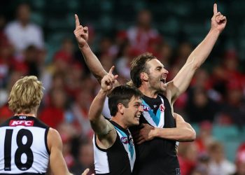 AFL investigating as Power forward admits to homophobic slur during Bombers game