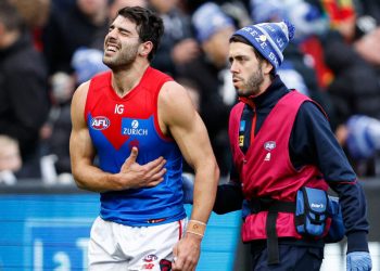 Footy Fix: The Dees are as busted as Petracca’s ribs