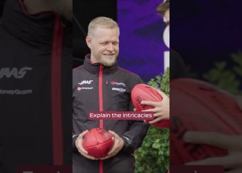 Kevin Magnussen tries Aussie Rules Footy
