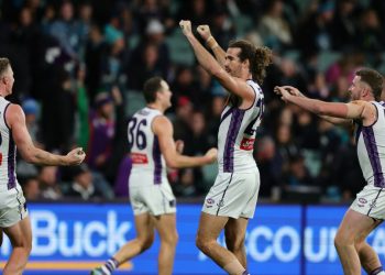 Footy Fix: The handball of the year, a fearless gameplan and TWO captain’s goals